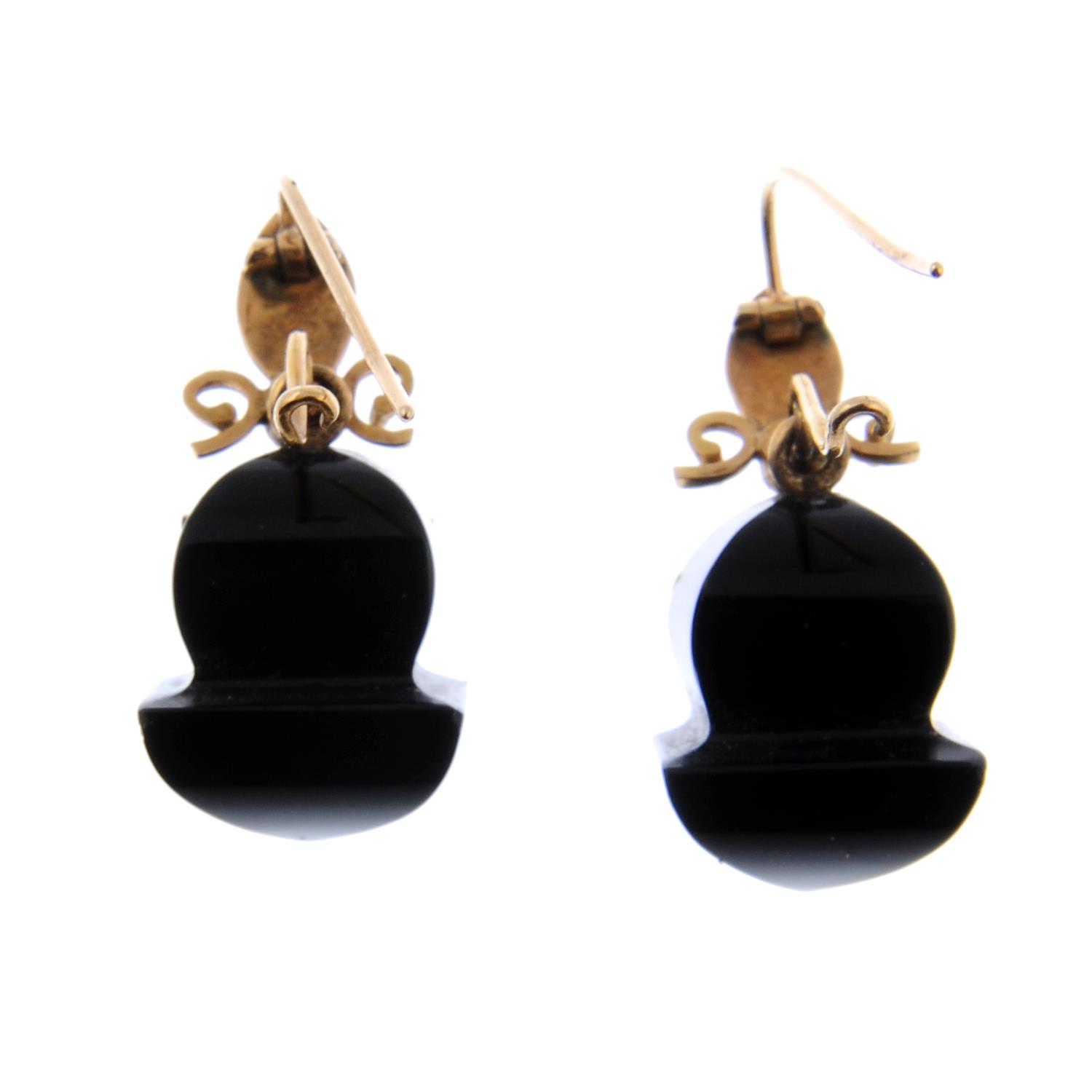 A pair of onyx, split pearl and enamel earrings. - Image 2 of 2