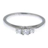 A 9ct gold brilliant-cut diamond three-stone ring.Estimated total diamond weight 0.25ct.Hallmarks