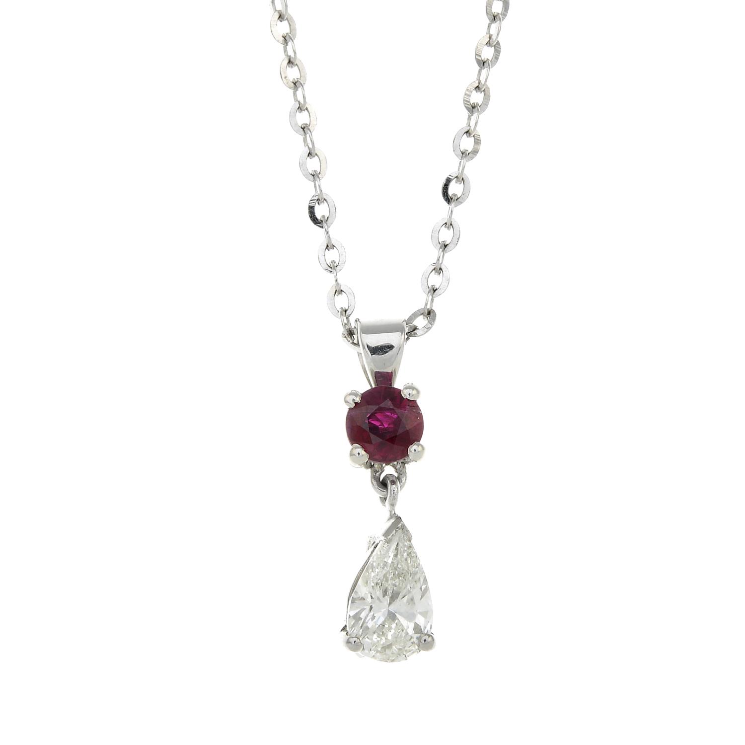 A pear-shape diamond and ruby pendant, with chain.