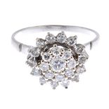 A diamond floral cluster ring.