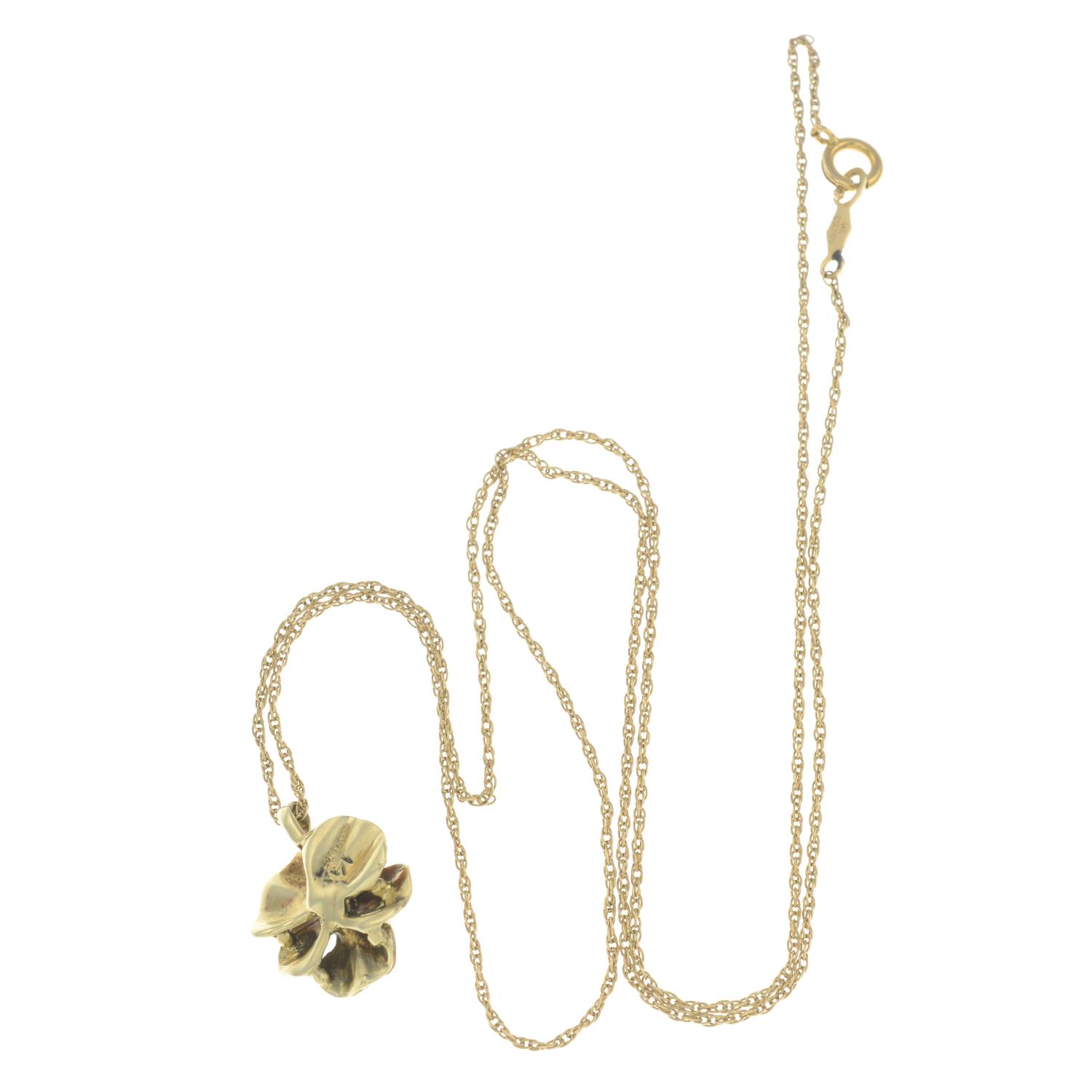 An early 20th century 14ct gold seed pearl and enamel pansy pendant, with chain.Stamped 14K. - Image 2 of 2