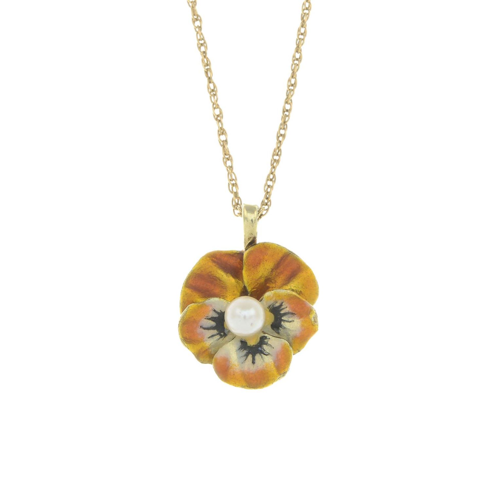 An early 20th century 14ct gold seed pearl and enamel pansy pendant, with chain.Stamped 14K.