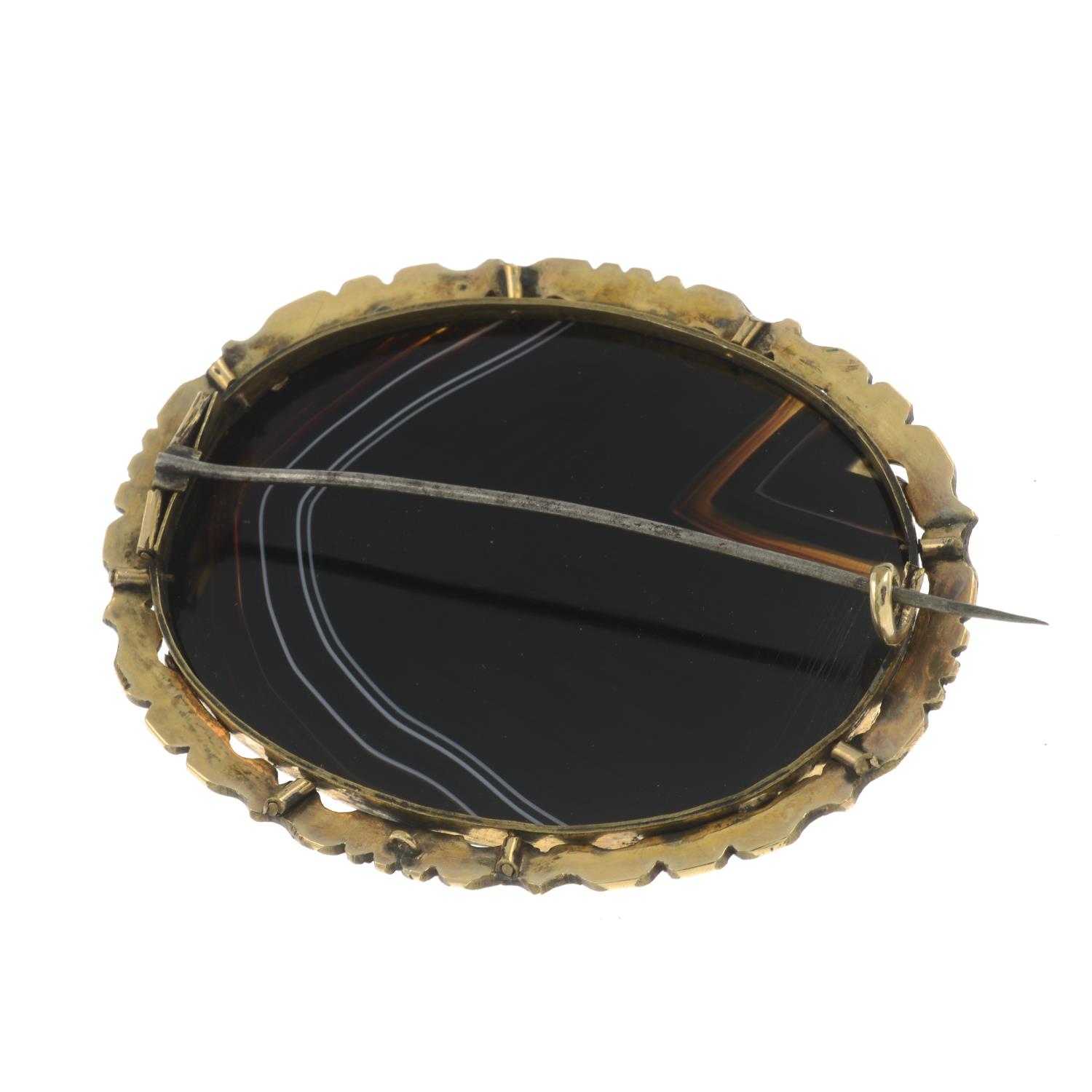 A late 19th century banded agate brooch.Length 7.5cms. - Image 2 of 2