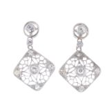 A pair of old-cut diamond drop earrings.