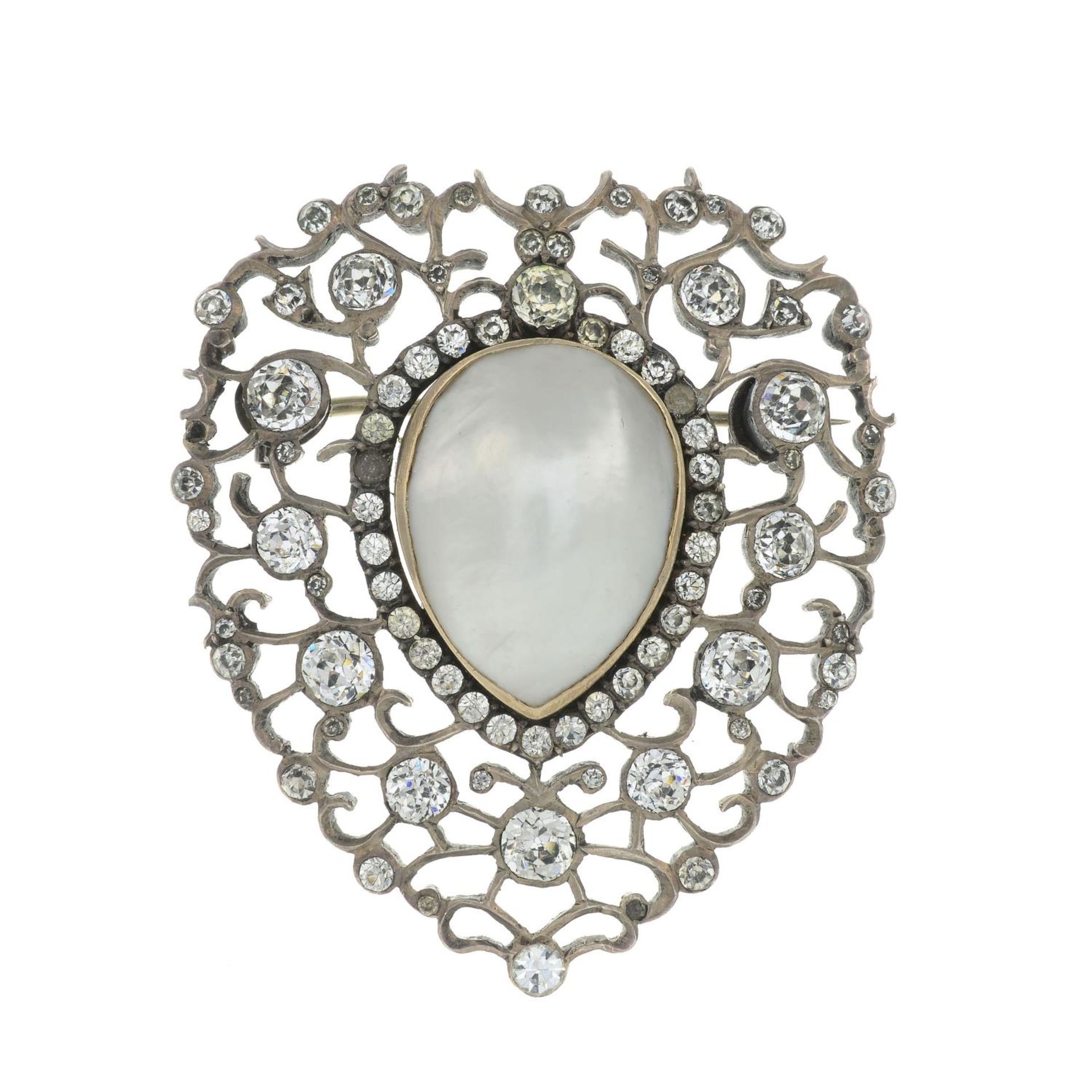 A late 19th century silver mabe pearl and paste brooch.Length 5cms.