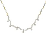A brilliant-cut diamond bi-colour necklace.Estimated total diamond weight 1ct.Stamped 14ct,