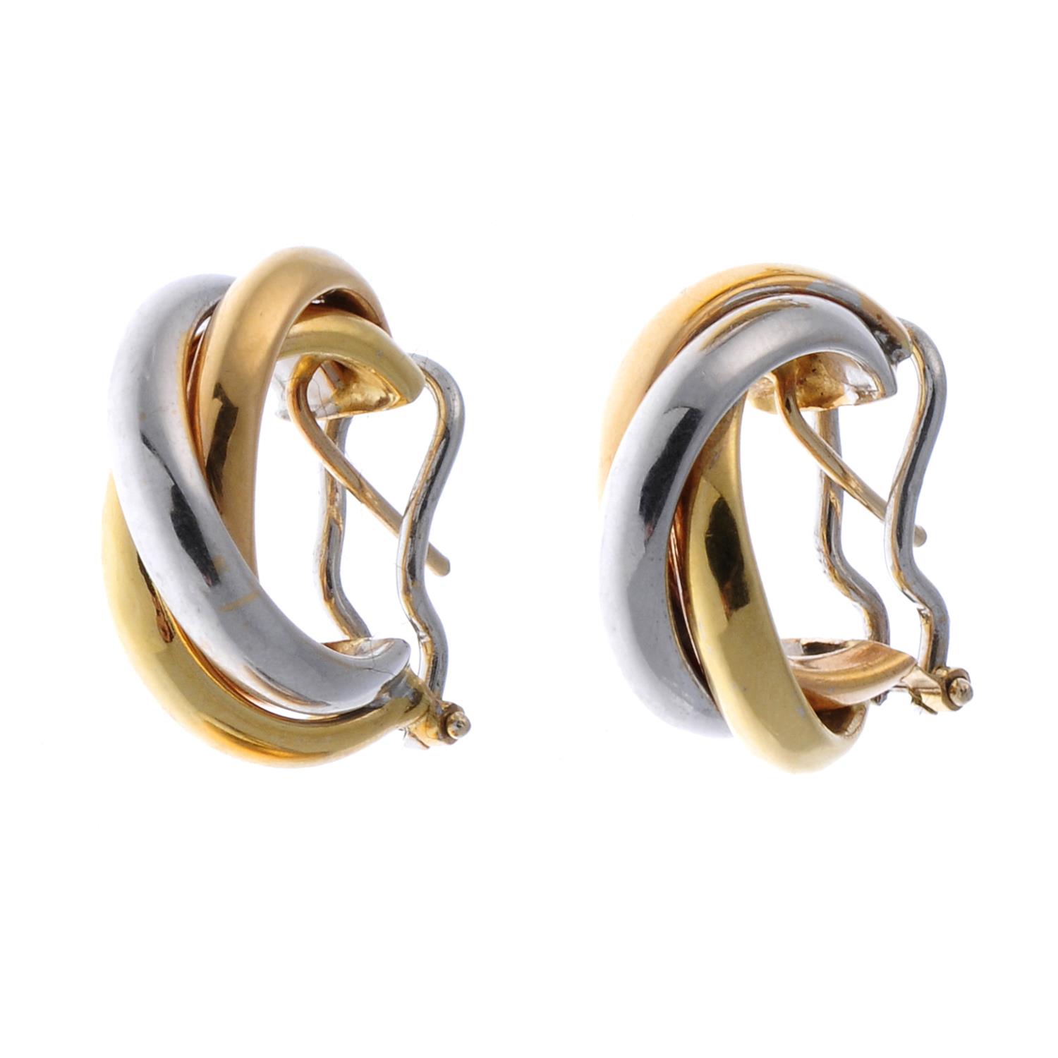 A pair of tri-colour hoop earrings.