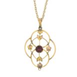 An early 20th century 9ct gold paste pendant, suspended from a 9ct gold chain.Pendant stamped 9ct.