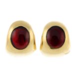 A pair of garnet earrings.