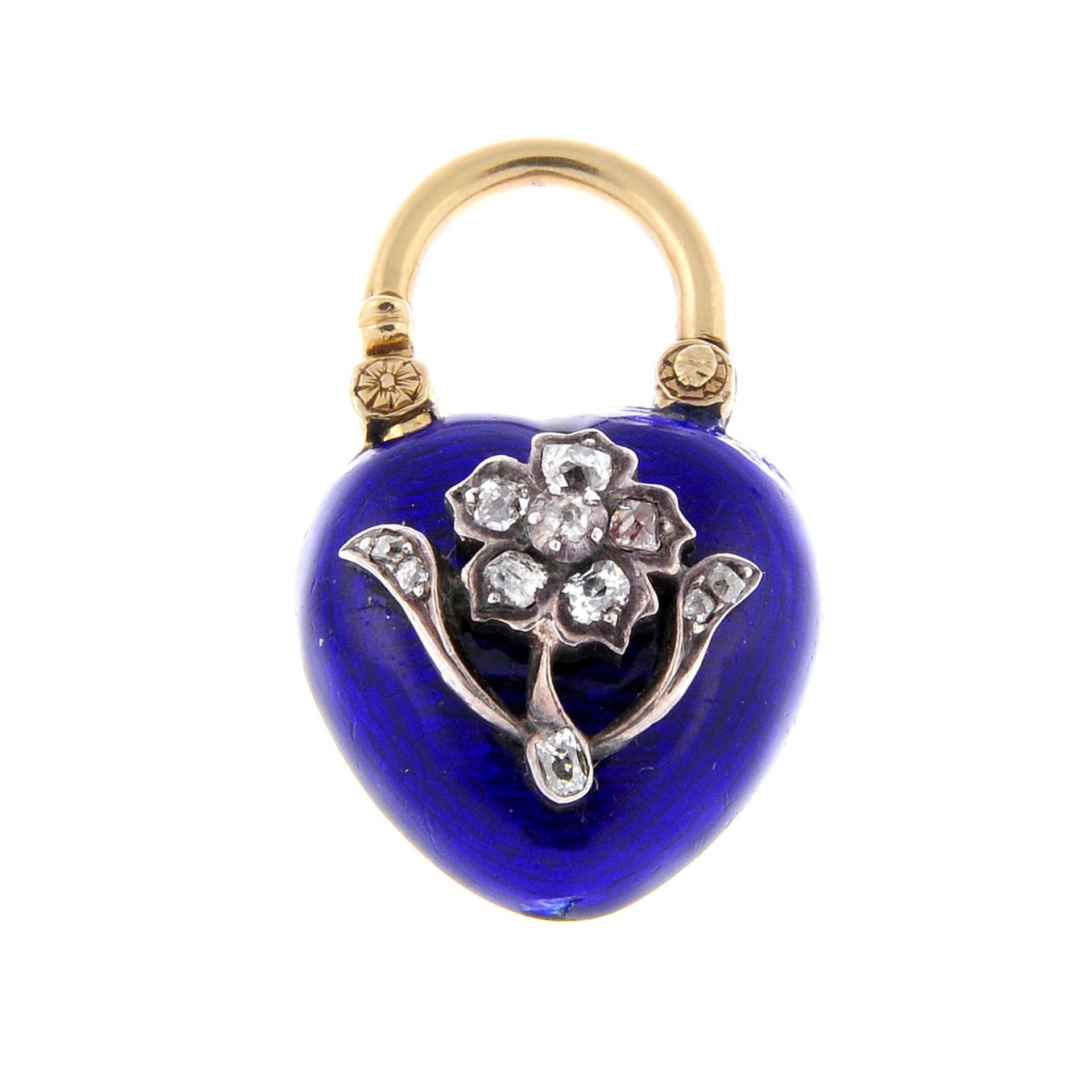 A mid Victorian gold and enamel heart-shape lock pendant, with old-cut diamond floral highlight.