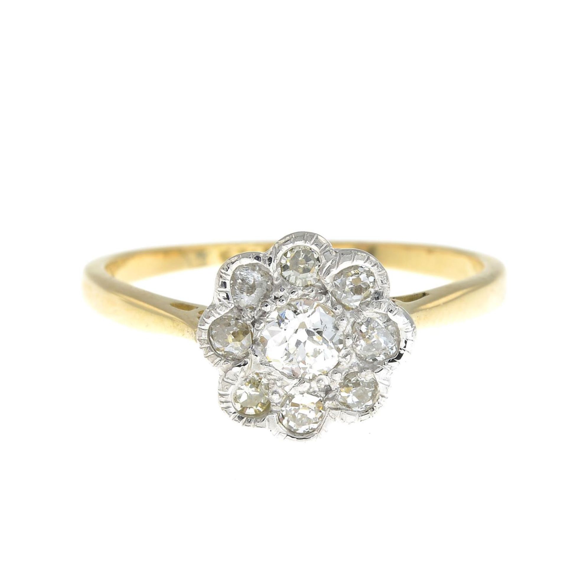 A diamond cluster ring.Estimated total diamond weight 0.30ct,