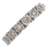 A diamond half eternity ring.Estimated total diamond weight 0.07ct.Stamped 750.Ring size J.