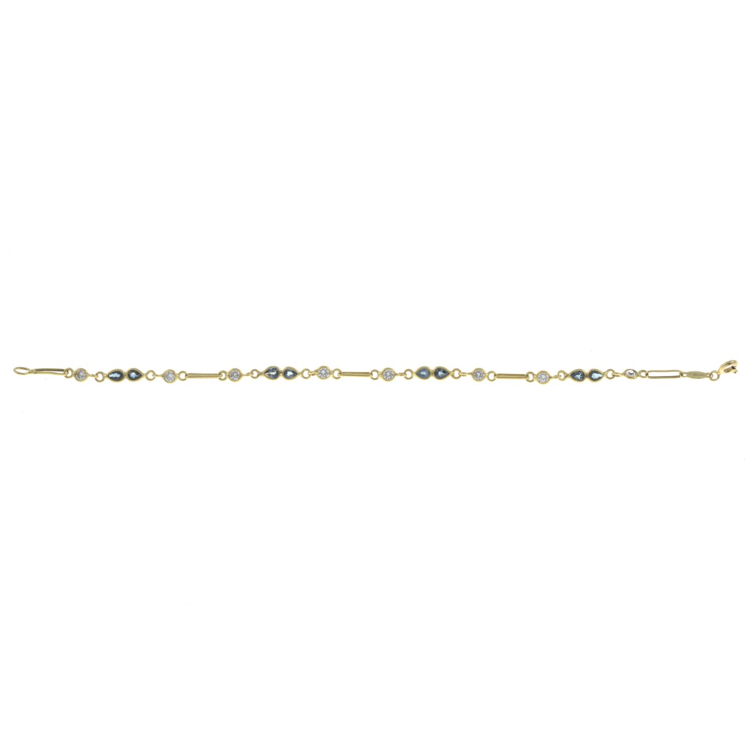 An 18ct gold sapphire and colourless gem bracelet.Import marks for London, 1988.Length 18cms. - Image 2 of 3