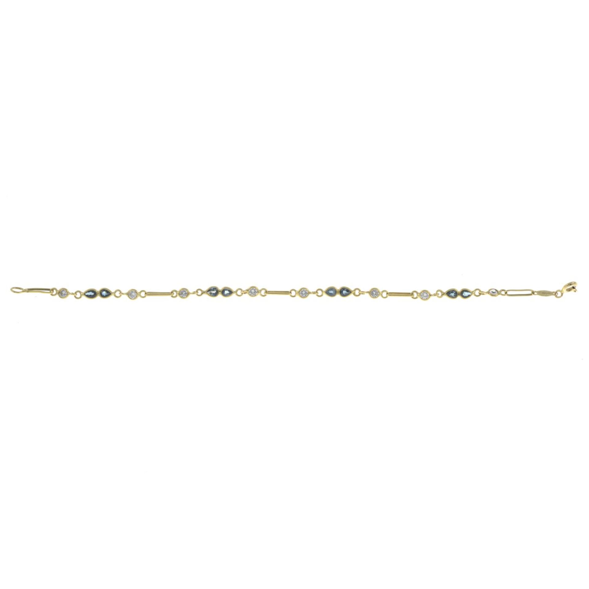 An 18ct gold sapphire and colourless gem bracelet.Import marks for London, 1988.Length 18cms. - Bild 2 aus 3