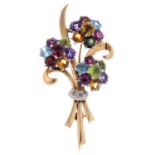 A mid 20th century 9ct gold gem-set cluster floral spray brooch, with rose-cut diamond accents.