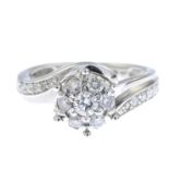 A 9ct gold diamond cluster ring.Total diamond weight 0.50ct,