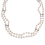 A cultured pearl two-row necklace, with 18ct gold diamond clasp and spacers.