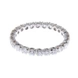 A platinum brilliant-cut diamond full eternity ring.Estimated total diamond weight 1.50cts,