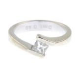 A square-shape diamond single-stone crossover ring.
