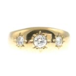 A diamond three-stone ring.Estimated total diamond weight 0.65ct,