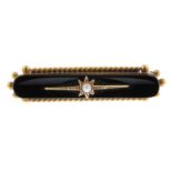 A late 19th century gold onyx and split pearl bar brooch.