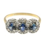 A sapphire and diamond dress ring.Estimated total diamond weight 0.15ct.