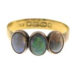 An opal three-stone ring, with 22ct gold band replacement.