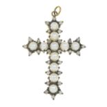 A seed pearl and diamond cross pendant.Estimated total diamond weight 0.50cts.