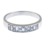 A vari-cut diamond half eternity ring.