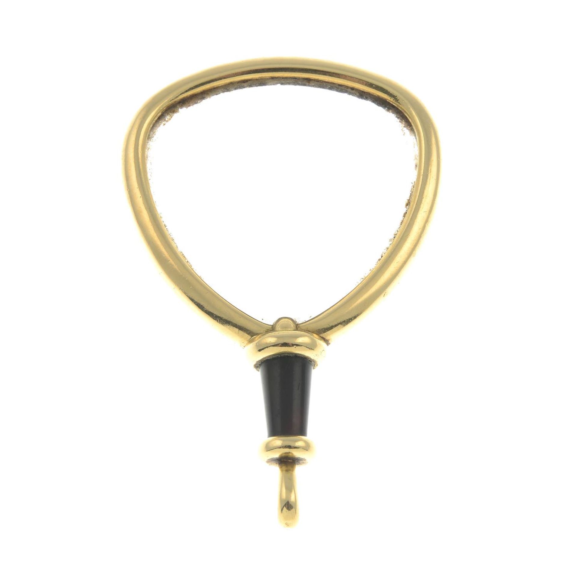 A magnifying glass.French assay marks for 18ct gold.Length 6.3cms.