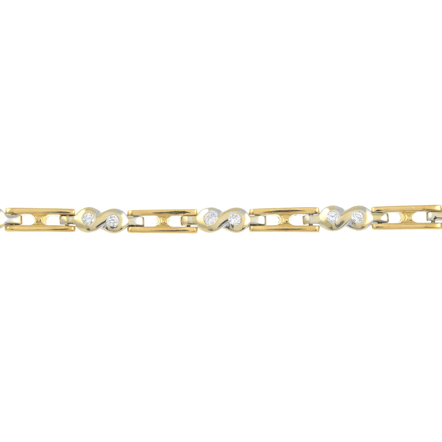An 18ct gold diamond bi-colour bracelet.One diamond deficient.Estimated total diamond weight