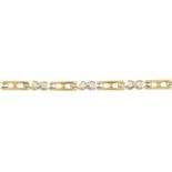 An 18ct gold diamond bi-colour bracelet.One diamond deficient.Estimated total diamond weight