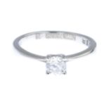 A 9ct gold diamond single-stone ring.With report 50735700509,