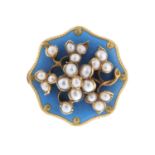 A mid Victorian gold seed pearl and enamel floral brooch.