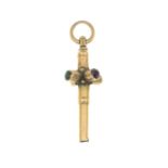 A late Victorian gold turquoise and garnet watch key.Length 3.4cms.