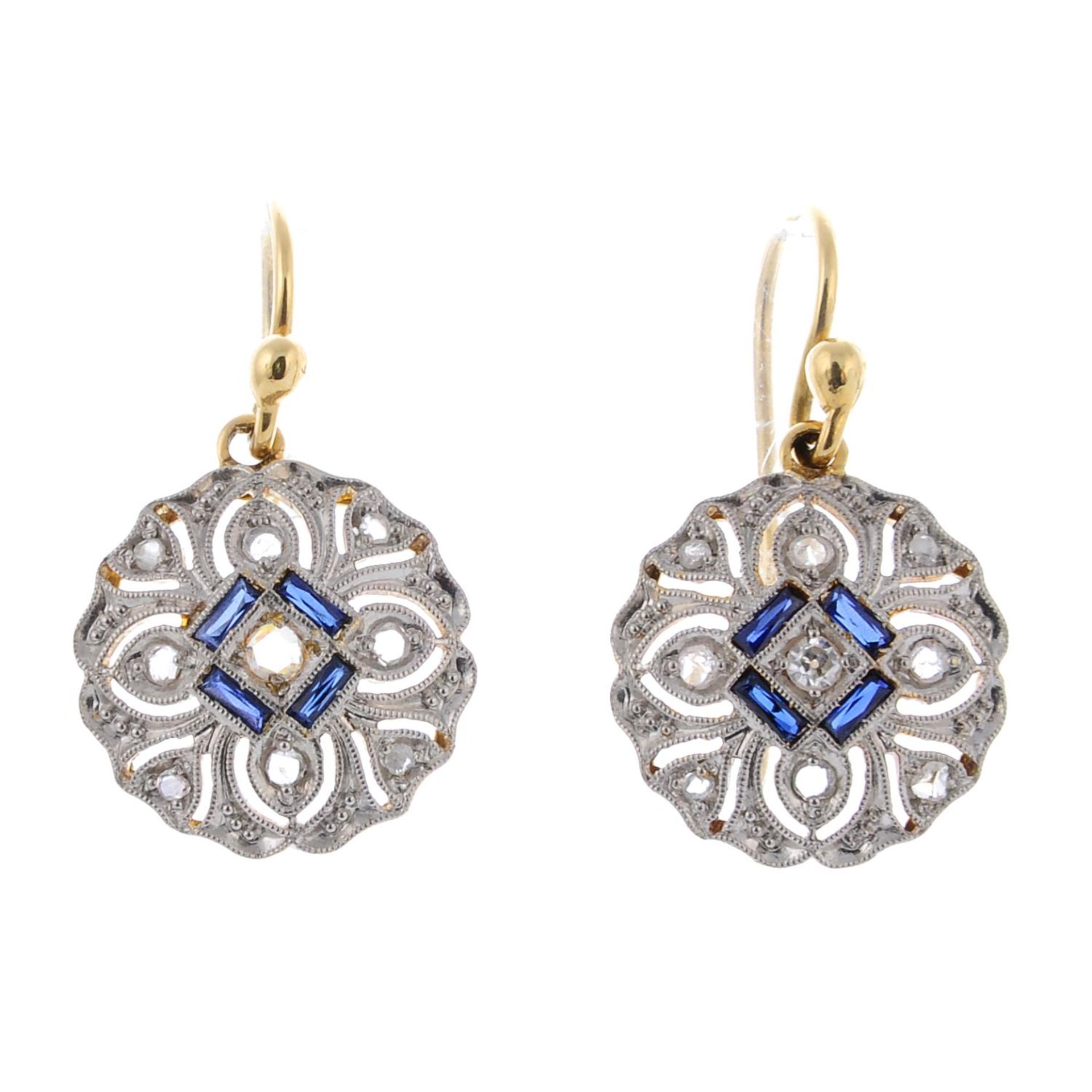 A pair of sapphire and rose-cut diamond cluster drop earrings.