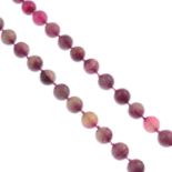 A dyed rose quartz single-strand necklace.Length 100cm.