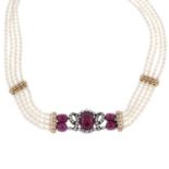 A cultured pearl, diamond and glass-filled ruby three-row necklace.