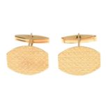 A pair of cufflinks.Length of cufflink face 2.1cms.