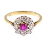 A ruby and diamond floral cluster ring.Estimated total diamond weight 0.40ct,