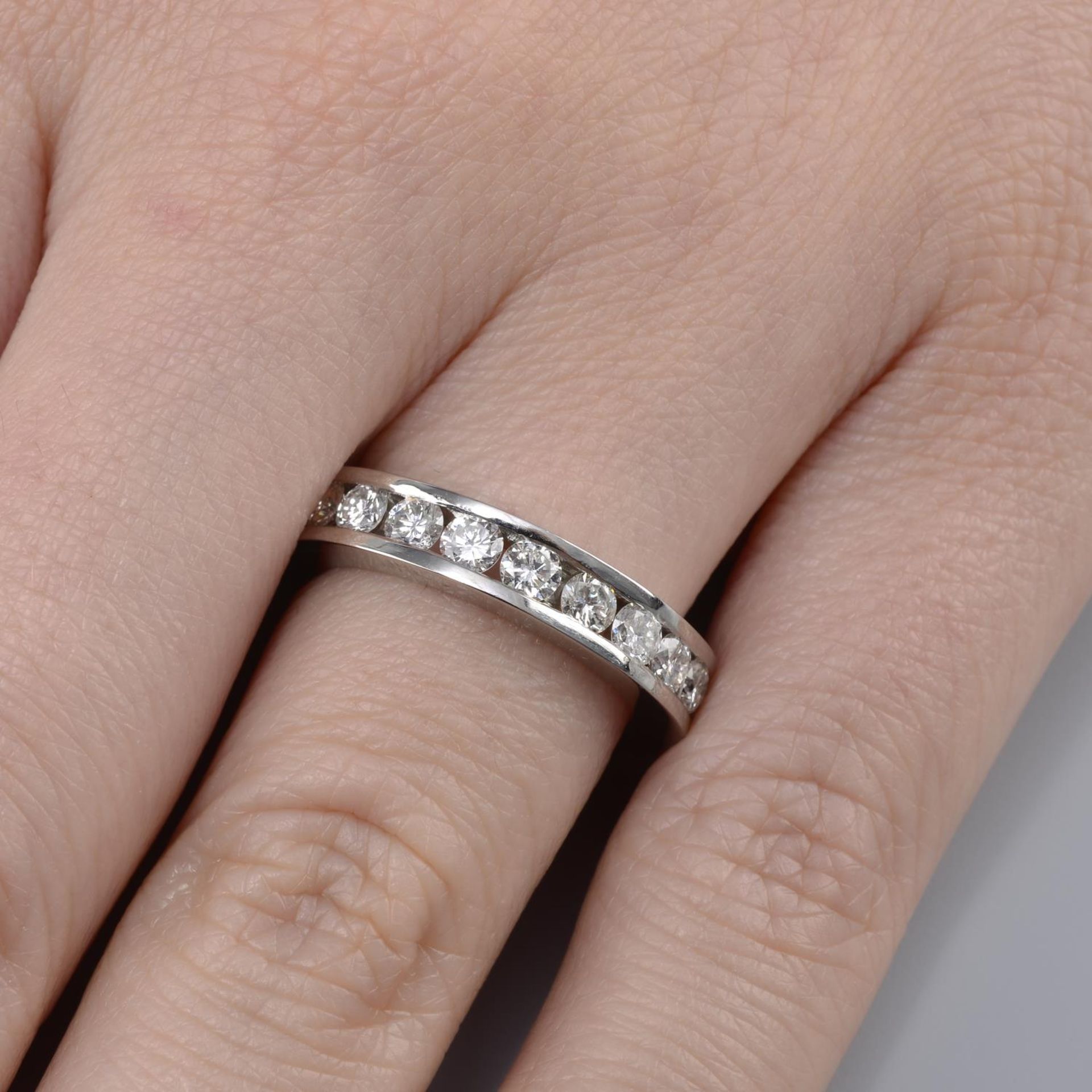 A platinum brilliant-cut diamond full eternity ring.Total diamond weight 3.65cts,