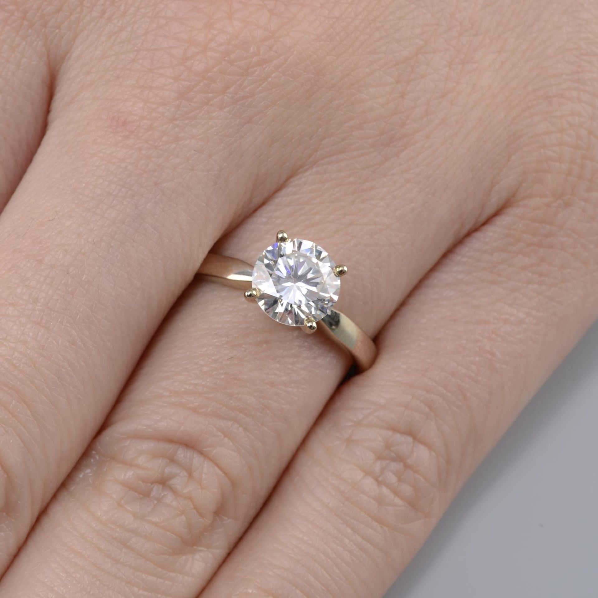 An 18ct gold brilliant-cut diamond single-stone ring.Diamond weight 1.49cts,
