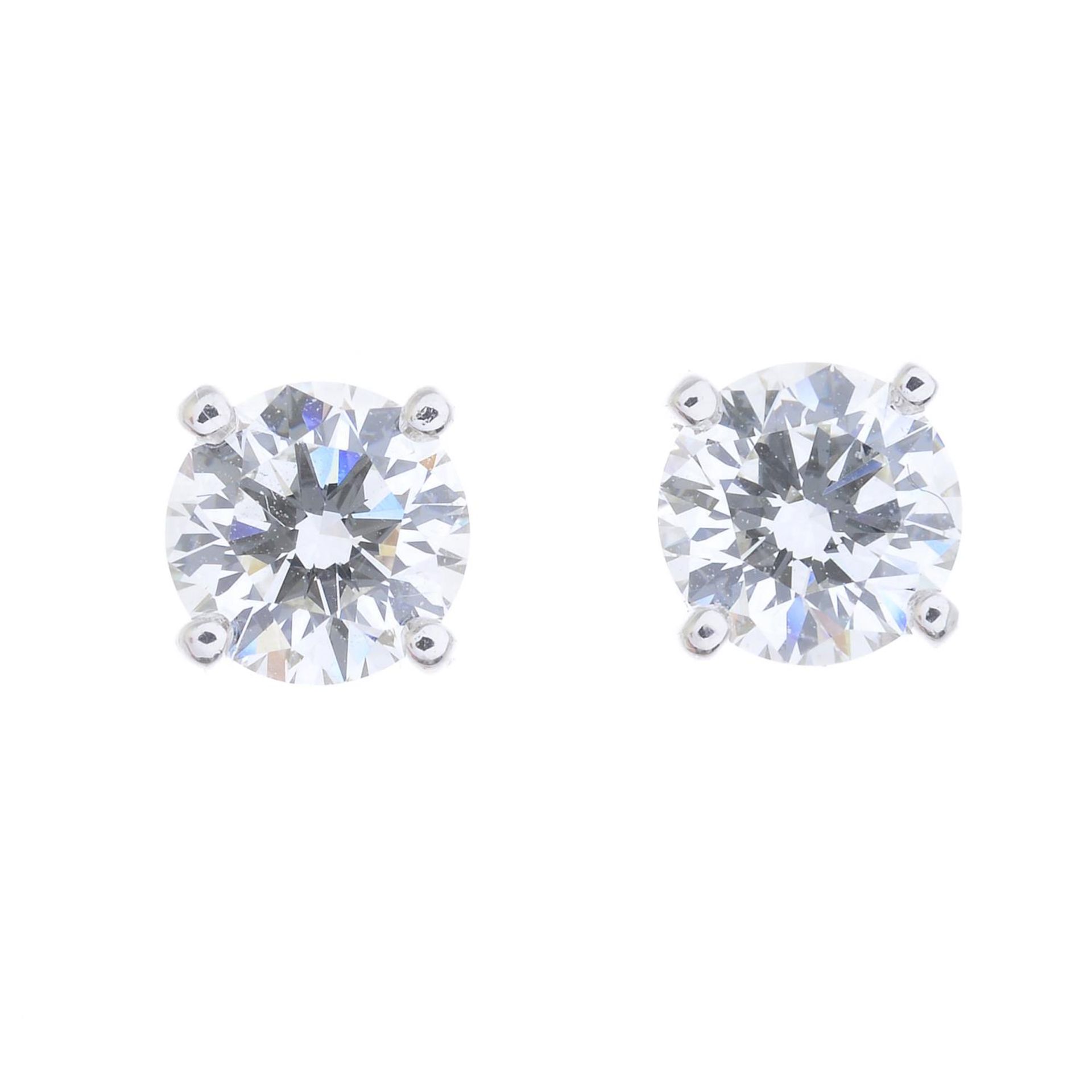 A pair of brilliant-cut diamond stud earrings, - Bild 3 aus 3