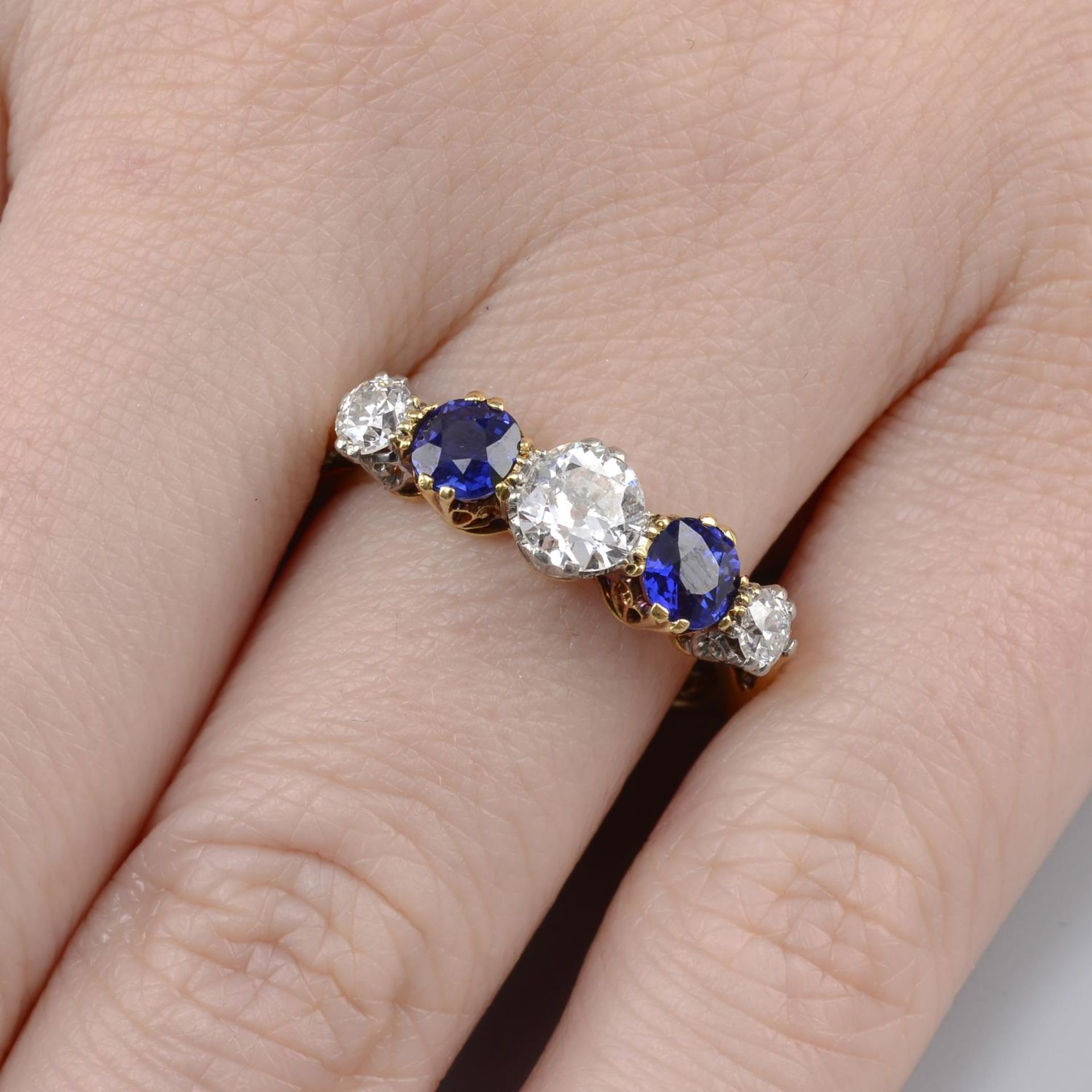 An Edwardian 18ct gold no heat sapphire and old-cut diamond five-stone ring.