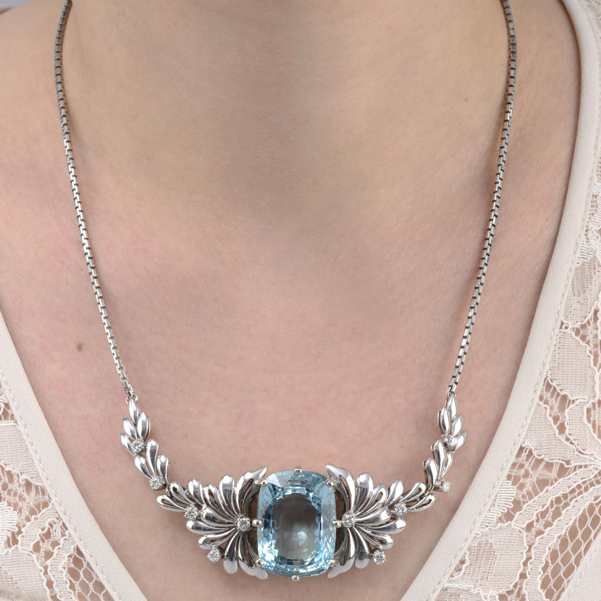 An aquamarine and brilliant-cut diamond necklace.Calculated aquamarine weight 38.02cts,