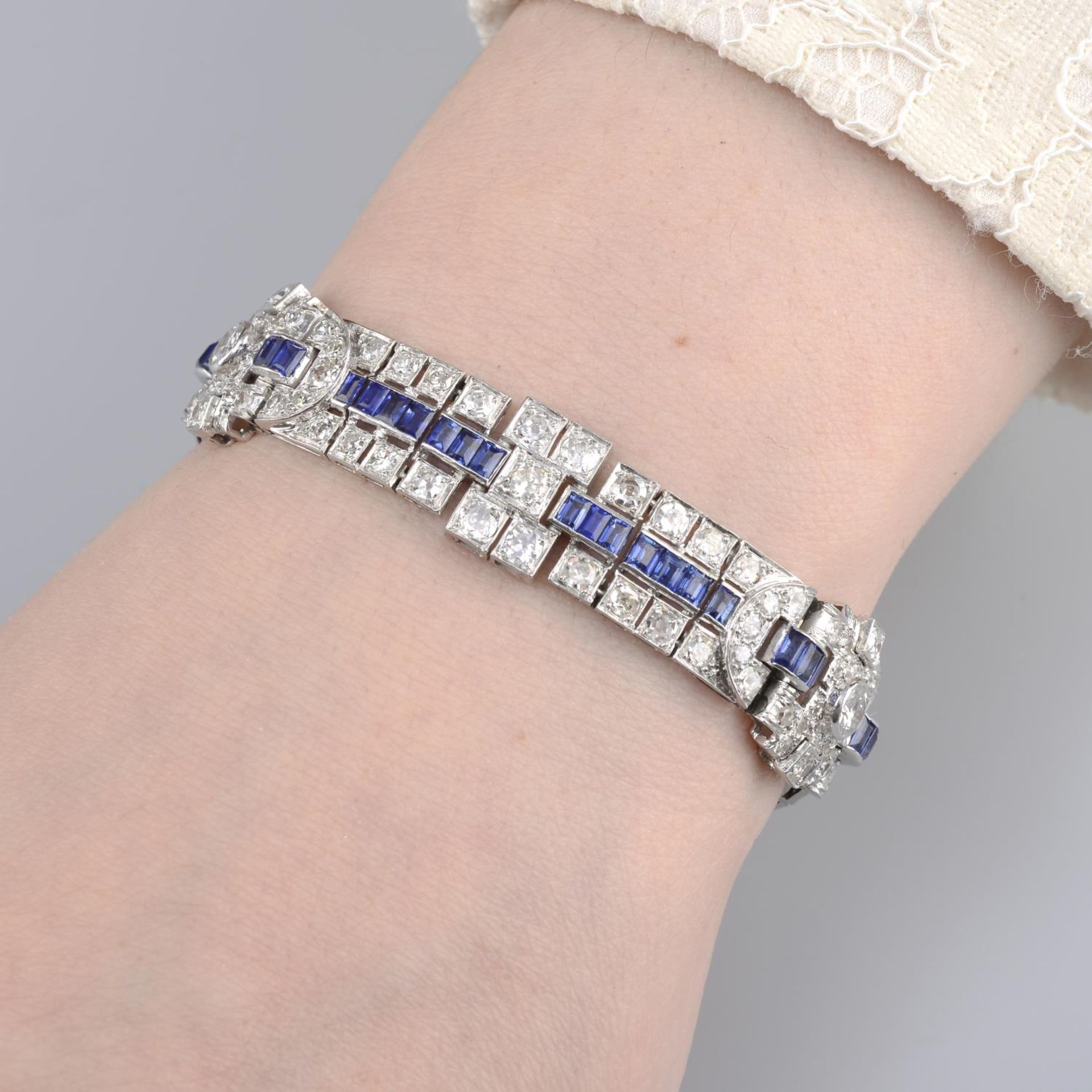 A mid 20th century sapphire and old-cut diamond bracelet.Estimated total diamond weight 6.40cts,