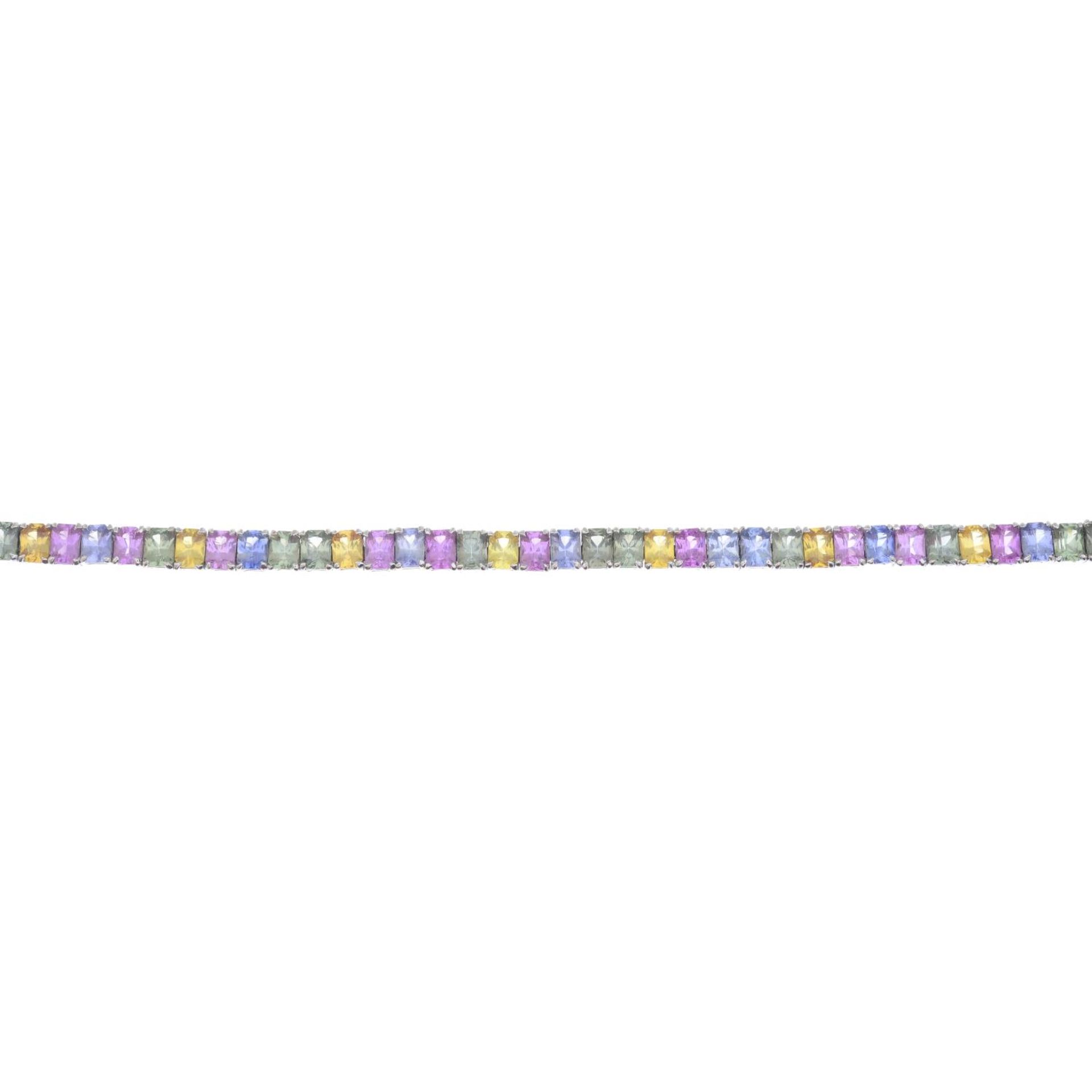 An 18ct gold vari-hue sapphire line bracelet.Total sapphire calculated weight 16.50cts, - Bild 4 aus 4