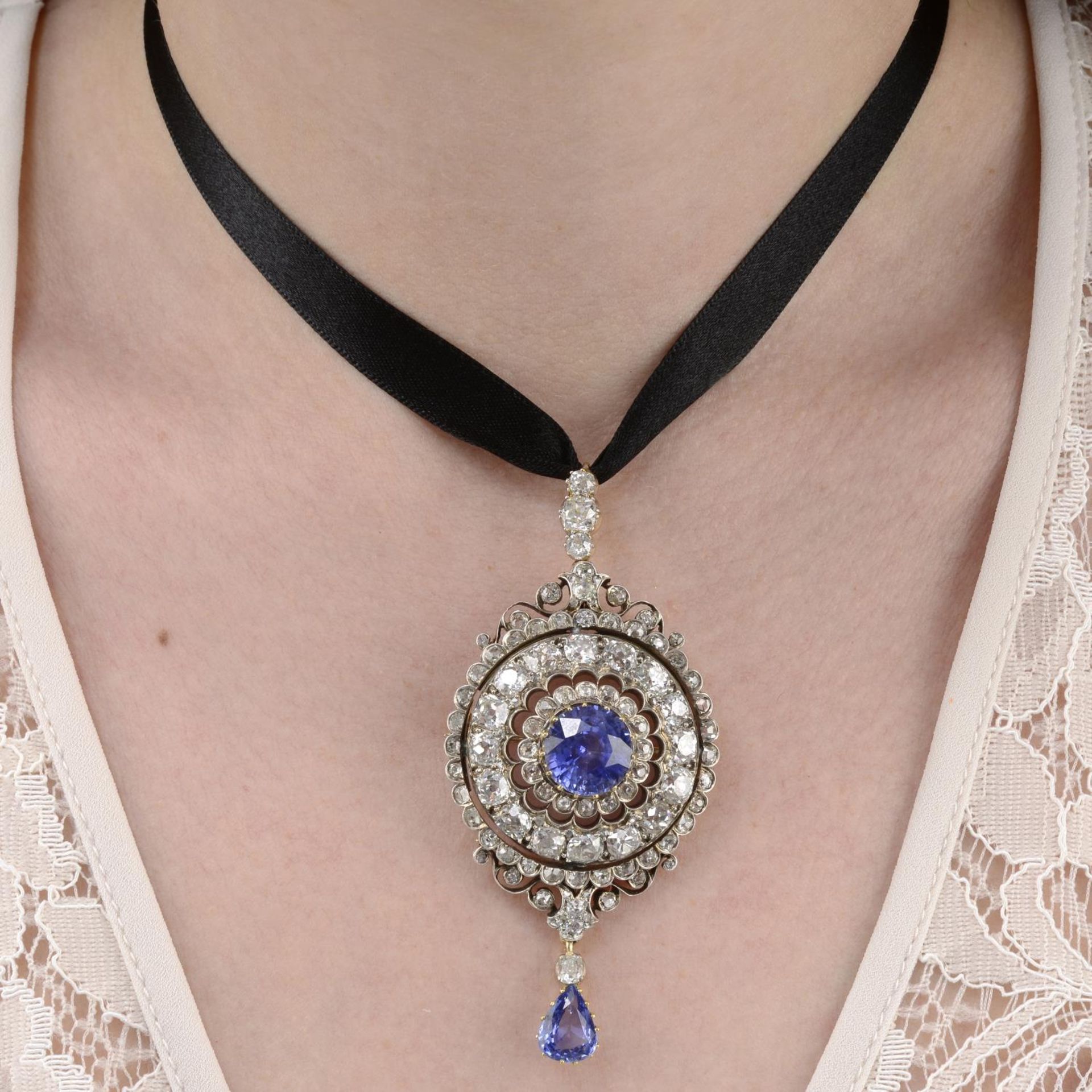 A late 19th century Sri Lankan sapphire and old-cut diamond pendant.With report 78125-78,