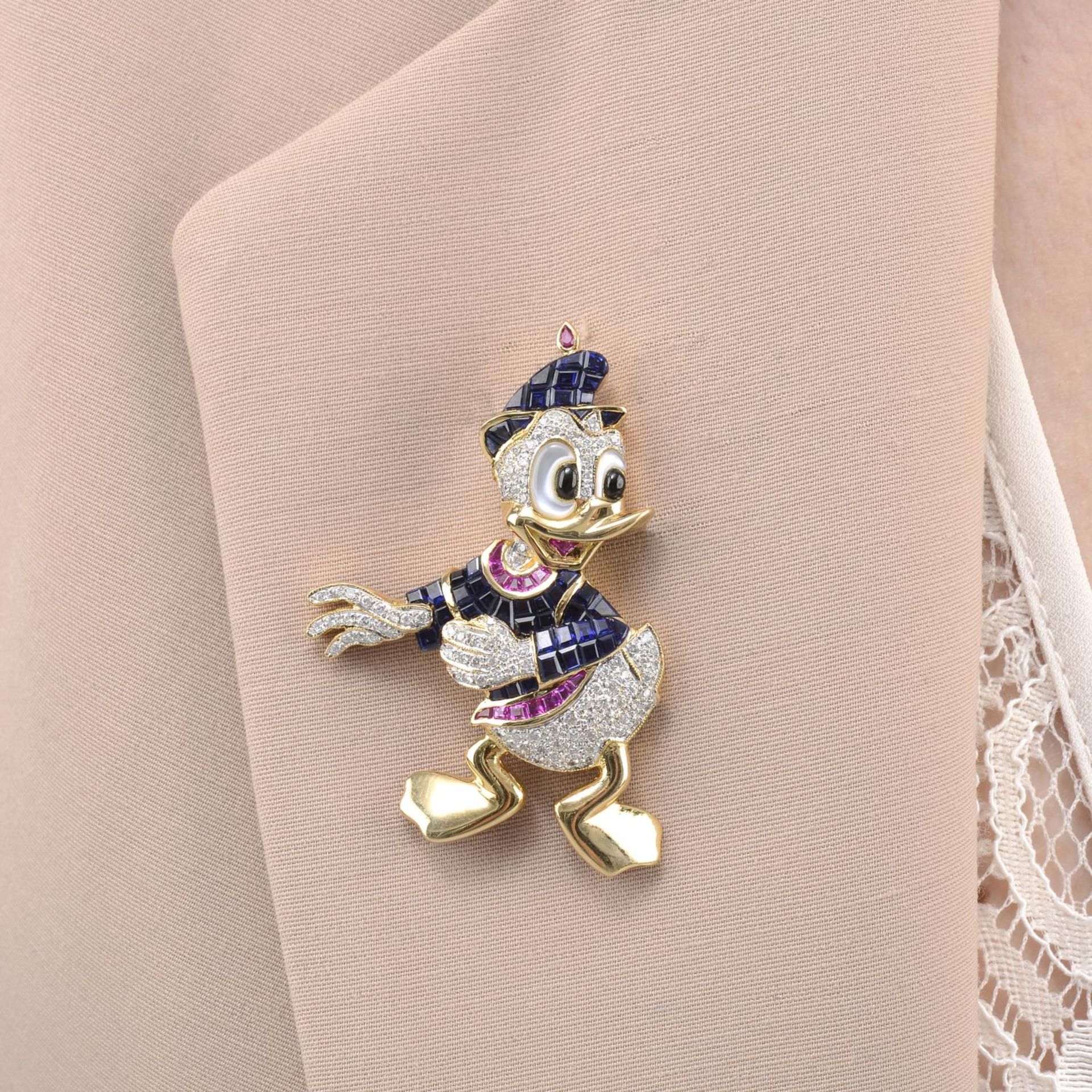 An 18ct gold pave-set diamond novelty duck brooch,