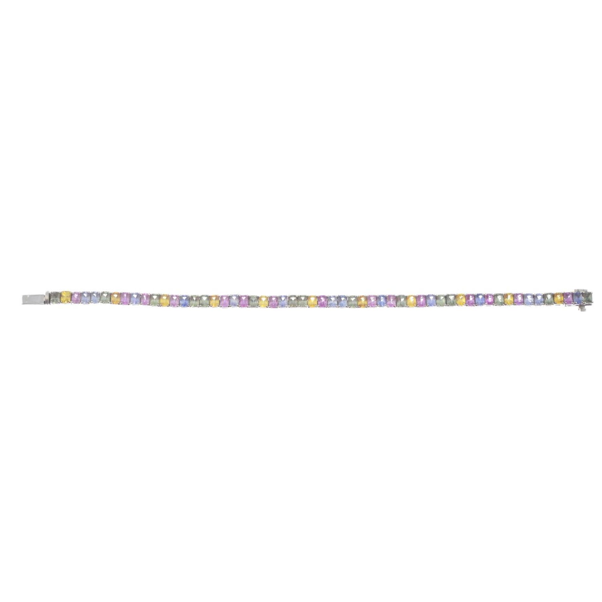 An 18ct gold vari-hue sapphire line bracelet.Total sapphire calculated weight 16.50cts, - Bild 2 aus 4